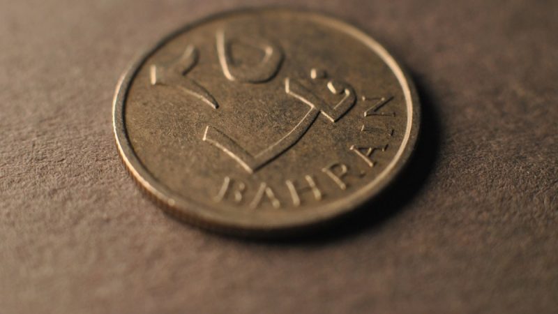 A close up of a coin on a table